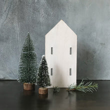 White Tall Wooden House