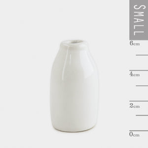 Little pottery milk bottle